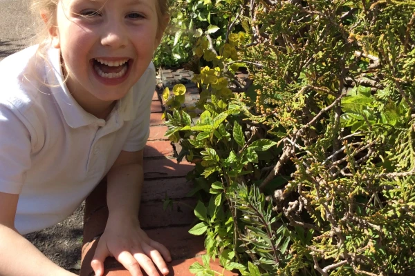 Girl looking at plants